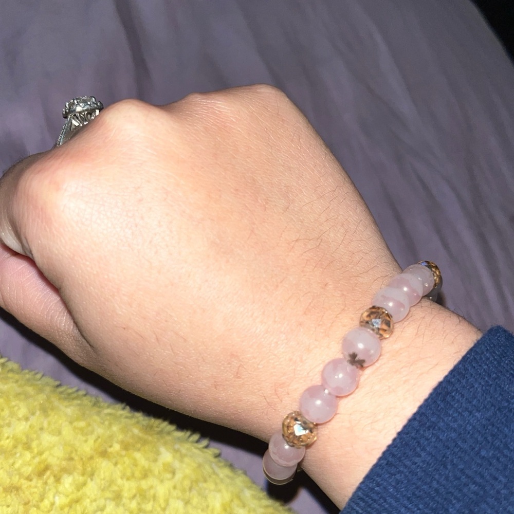 Pink crystal bracelet with gold accents